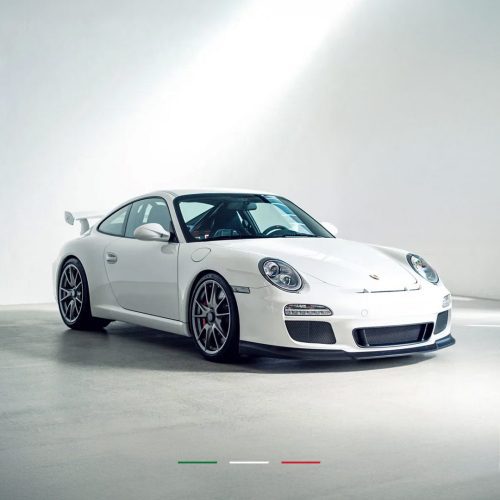 521652574_122189070254282422_6083486881057524952_n white car fitted with front splitter and a rear diffuser